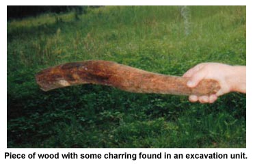 Piece of wood with some charring found in an excavation unit. Piece of wood with some charring found in an excavation unit.