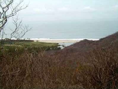 Figure 16. View from a hill top terrace of RH07 El Guapote toward the mouth of the R&iacute;o Huamelula.
