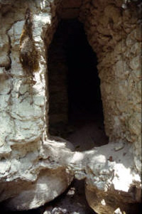 Figure 19. Balakbal, Structure V, doorway in west wall and two partially exposed altars; view to the east. Figure 19. Balakbal, Structure V, doorway in west wall and two partially exposed altars; view to the east.