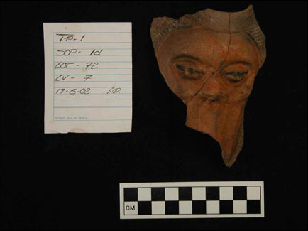 Figure 6. Locona phase effigy tecomate in the form of a half human, half duck face. Figure 6. Locona phase effigy tecomate in the form of a half human, half duck face.