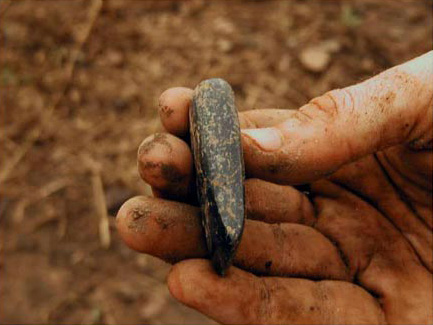 Figure 12. A jade adze recovered from the Conchas phase construction fill of Mound 1 in Suboperation 3a. Figure 12. A jade adze recovered from the Conchas phase construction fill of Mound 1 in Suboperation 3a.