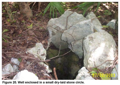 Figure 20. Well enclosed in a small dry-laid stone circle. Figure 20. Well enclosed in a small dry-laid stone circle.
