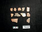 Undesig. Glyph Incised Chacalhaaz. Click to enlarge.