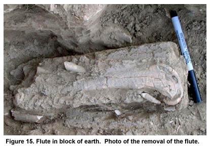 Figure 15. Flute in block of earth. Photo of the removal of the flute.