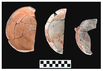 Figure 17. Overview Photograph of Three Halved Bowls from Problematic Deposit.