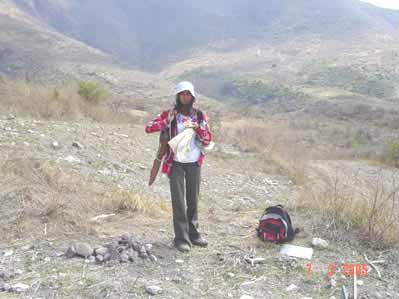 Figure 12. Osiris Quezada, surveying for lithics.