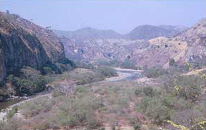 Figure 51a. View of Motagua River near Mixco Viejo. Figure 51a. View of Motagua River near Mixco Viejo.