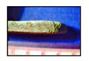 Figure 33b. Flat edge, possibly ground.