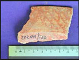 Figure 36f. Jocomico upper rim surface with cross-hatch design.