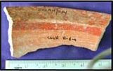 Figure 36i. Cuchillo incised upper rim and neck interior showing firing errorsbubbling and small spalls.