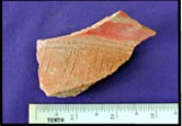 Figure 36k. Jocomico incised neck and shoulder exterior.
