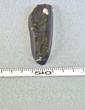Figure 39g. Site PVC 162, Obsidian Core Details, core with large inclusion.