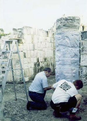 Figure 3: Ed Kurjack and Carlos Carmons pounding paper in Column 10. Figure 3: Ed Kurjack and Carlos Carmons pounding paper in Column 10.