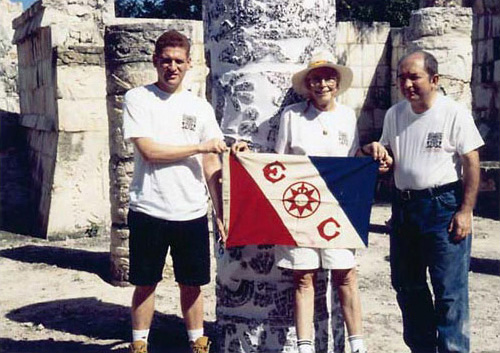 Figure 7: Carlos Carmons, Merle Greene Robertson, and Edward Kurjack (left to right) carrying the Explorers Club Flag. Figure 7: Carlos Carmons, Merle Greene Robertson, and Edward Kurjack (left to right) carrying the Explorers Club Flag.