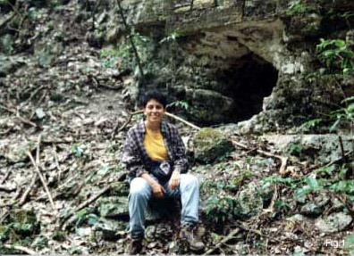 Figure 1. Author in front of a looted structure at Naact&uacute;n, locally called El Infierno or Infiern&oacute;n ("Hell"), located in dense jungle on the Guatemala-M&eacute;xico border, just 3 km north.