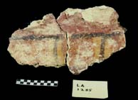 Figure 3:61 - A probable enframing element. Note the paint detail. These two fragments are from LA 1285.