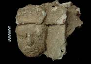Figure 3:85 - The face of a figure, perhaps representing a lesser elite.