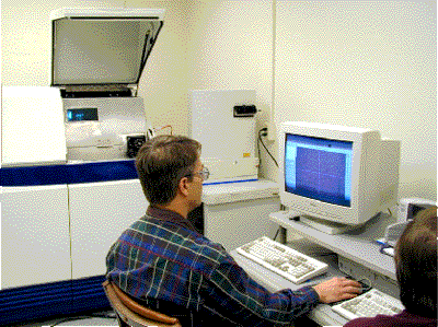 Figure 9: The Axiom (background left) and the laser-ablation system (background right) are controlled by separate PCs.