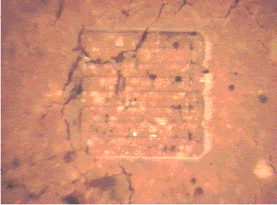 Figure 10: Close-up of clay test tile after laser ablation. The spacing of the rows is 95 microns, and the spot size was 100 microns, so there is slight overlap of the rows.