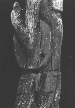 Figure 9. PL view of the Figurine showing the fan-like object held in the left hand. Figure 9. PL view of the Figurine showing the fan-like object held in the left hand.