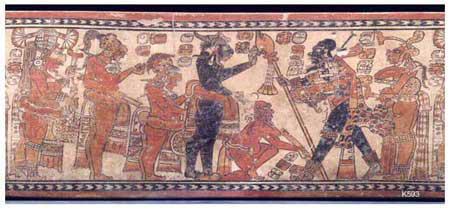 Figure 10. Kerr Maya Vase Archive, K593, The Chama Vase, showing individual on right holding a fan under his left arm. Figure 10. Kerr Maya Vase Archive, K593, The Chama Vase, showing individual on right holding a fan under his left arm.