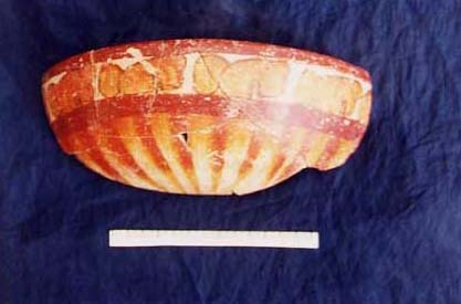 Figure 4d. Photo of a polychrome dish from Campeche with false Maya glyphs and sunburst motif.
