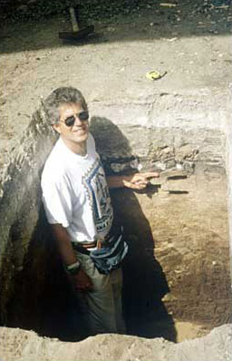 Figure 3b. Dr. Brenner starting the sampling in the test pit at Kaminaljuy&uacute;, 1999 season.